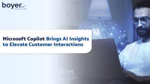 Image of a man using a laptop with Microsoft Copilot AI elements for enhanced customer interactions.